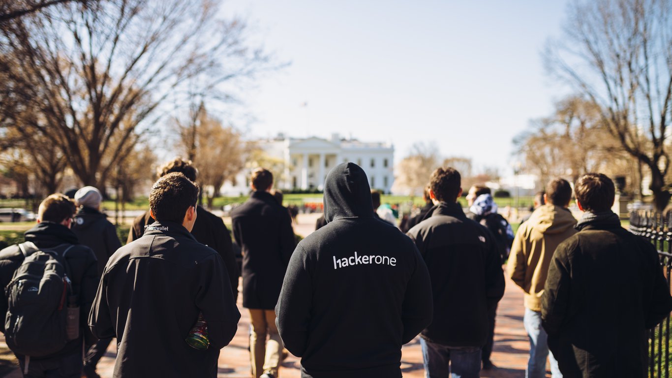 Hackers look towards to White House during a walking tour of Washington, D.C. on Friday, March 23, 2018