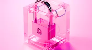 Pink lock inside a glass box