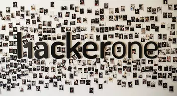 hackerone wall with small pictures of employees