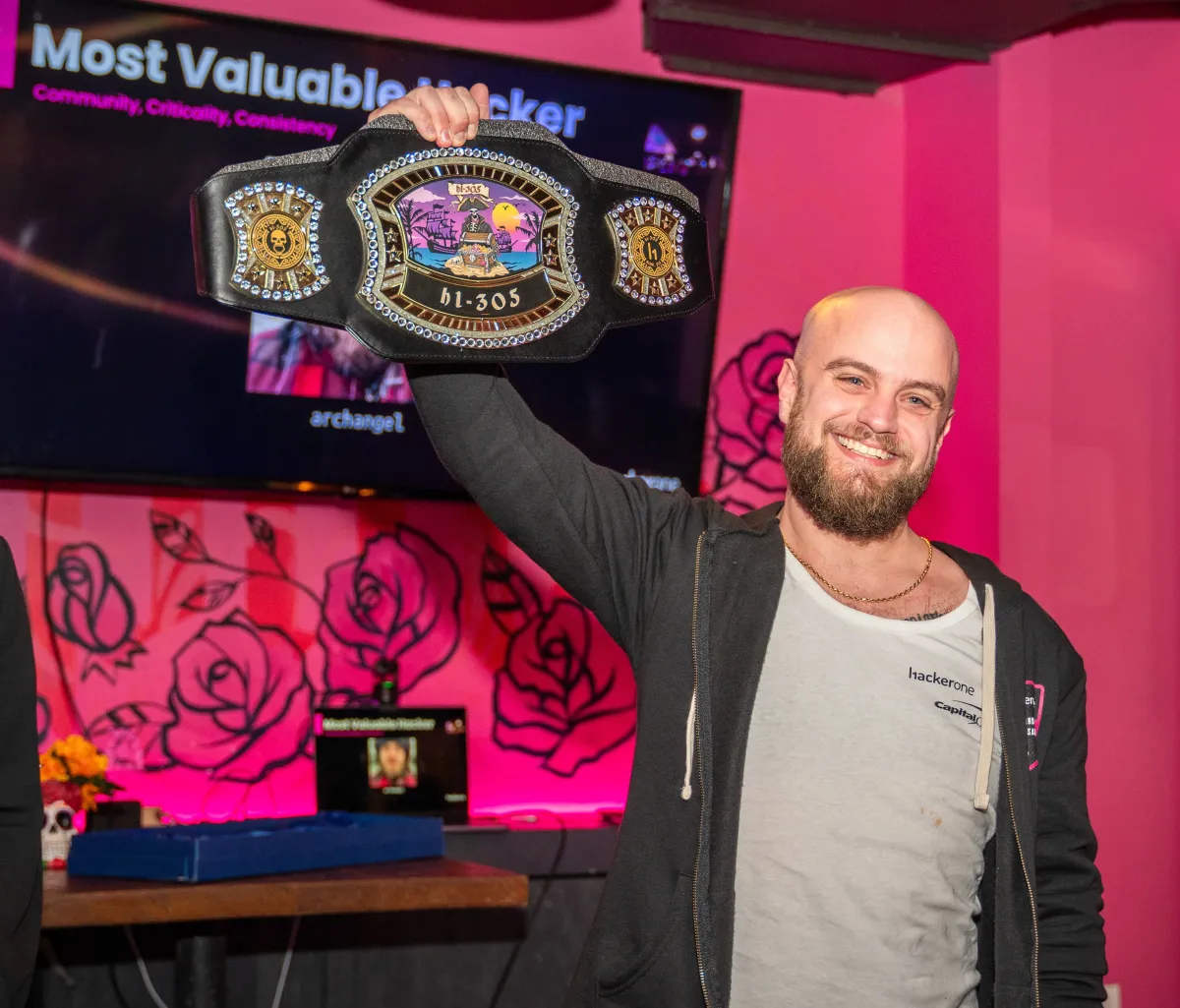 Douglas holding his championship belt in Miami
